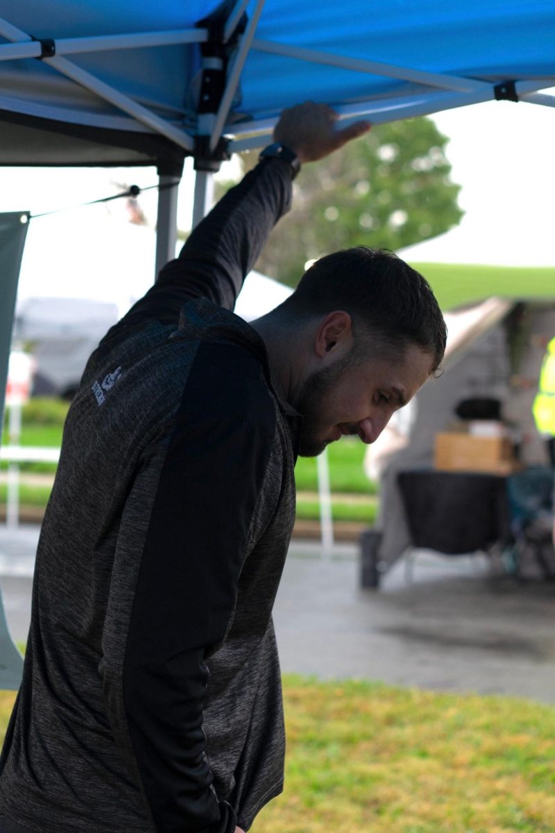 One of the vendors at the festival in disbelief due to the effects of the weather