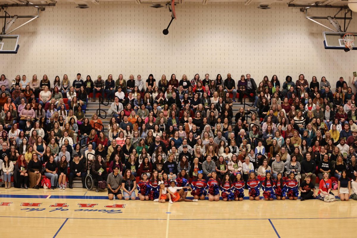 Burton, remembering that Park View's senior class photos are taken on the bleachers, wanted to replicate it for the fans who attended 10/14's book signing, so, as she explained, "we can remember today [10/14], so we can remember this old building."